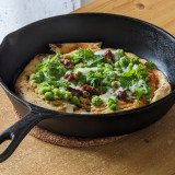 Flatbread with hummus, crushed peas and 'nduja